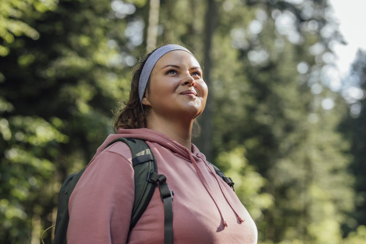 Woman hiking outdoors after gastric sleeve surgery