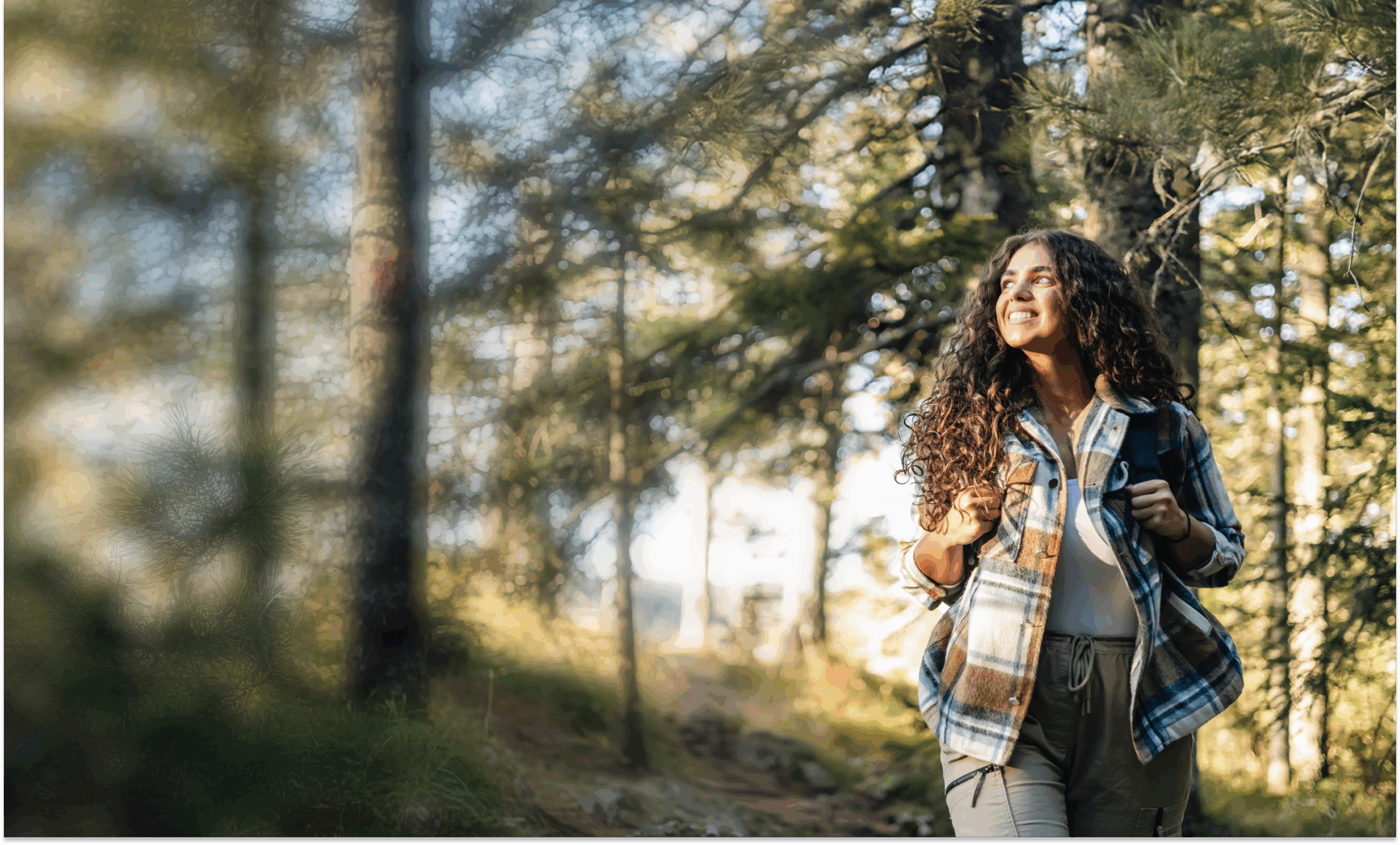 Woman walking in the forest