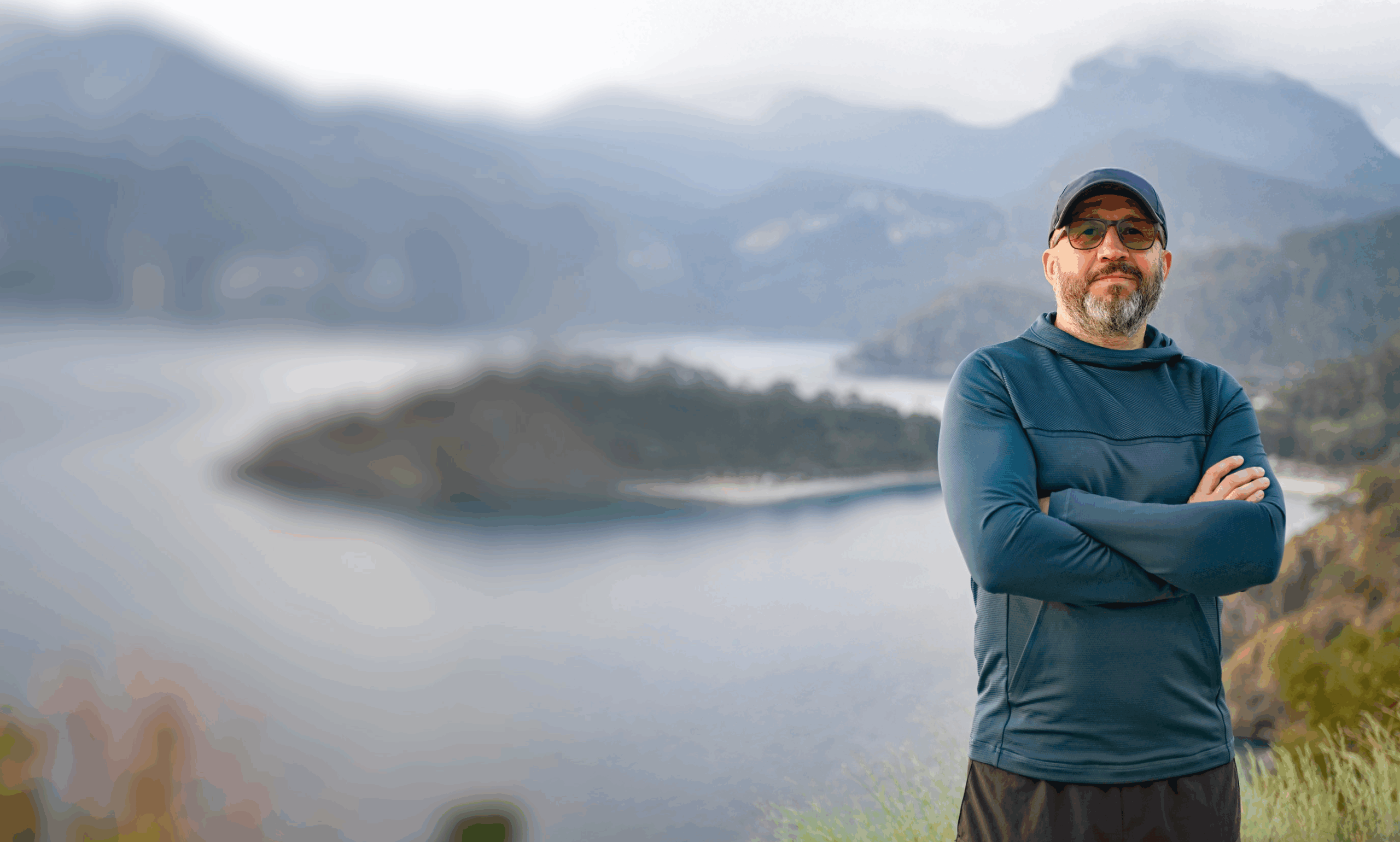 A man in front of the water